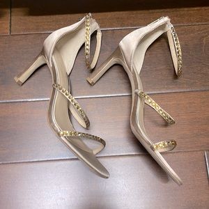 Beautiful jewel embellished heels perfect for a dressy occasion. Only worn once.